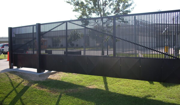 Security Gate Installed In Front Of Warehouse Building